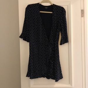 Navy polka dot wrap dress